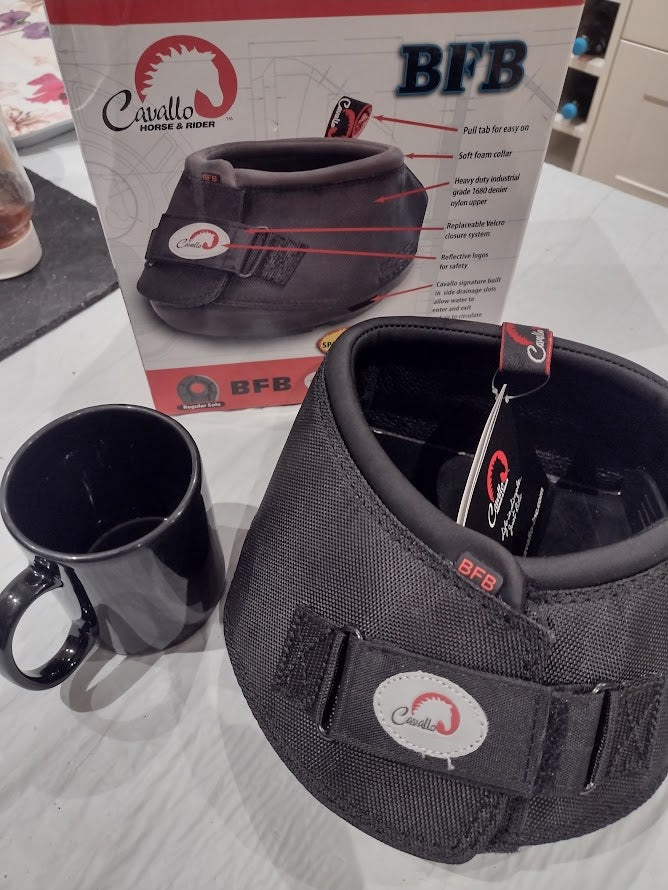 Cavallo Big Foot Boot and box with coffee cup as size comparison