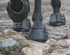 Cavallo Simple Boots On All Four Hooves Riding Over Stoney Terrain.